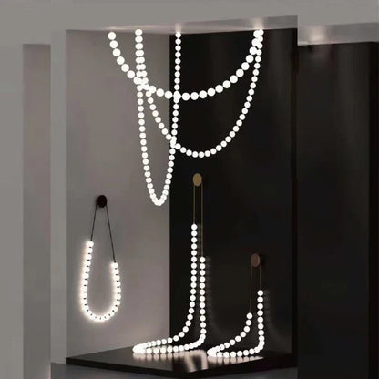 Lámpara de pared LED DecorBites™ con forma de collar para mesilla de noche y sala de estar