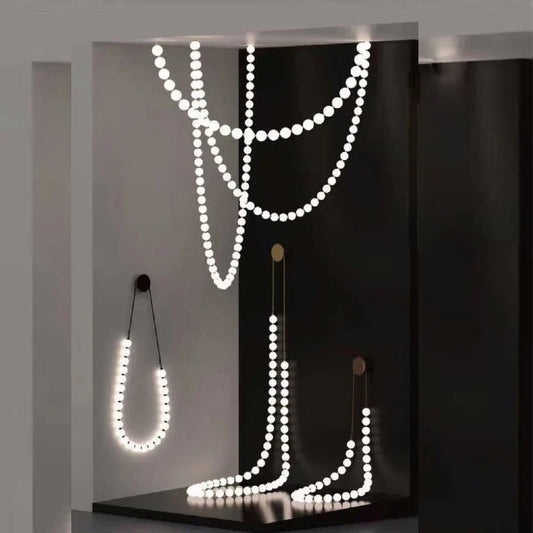 Lámpara de pared LED DecorBites™ con forma de collar para mesilla de noche y sala de estar