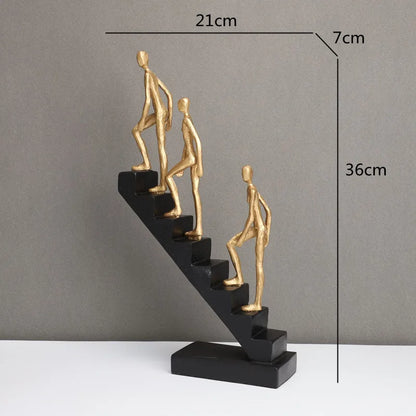 DecorBites™ Escultura abstracta de hombre dorado escalando escaleras Adornos para el hogar