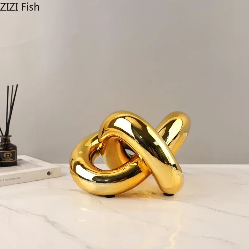 DecorBites™ Gold-plated Knot Ornaments: Modern Geometric Resin Desk Decor & Room Craft