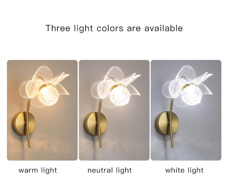 Creative floral decorative gold led wall lamp featuring a gold-toned sconce with a delicate translucent butterfly-shaped shade and an illuminated central globe for bedroom use.