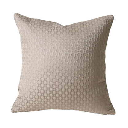 Funda de almohada DecorBites™ con diseño geométrico de anillos convexos en jacquard color capuchino.