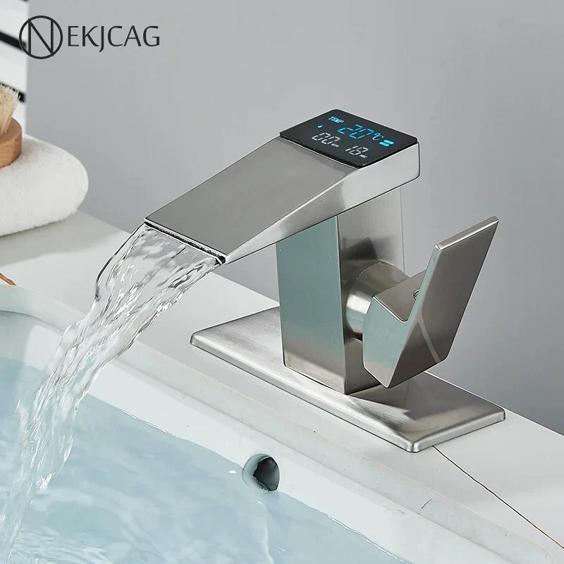 Grifo mezclador de agua fría y caliente con efecto cascada LED DecorBites™ para instalación en encimera de baño