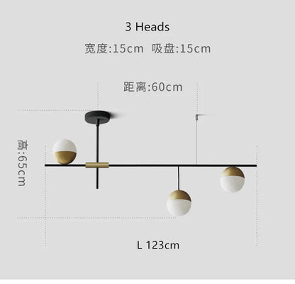 ثريا خطية بتصميم كرة زجاجية من ديكوربايتس™: إضاءة فنية عصرية للمطابخ والفنادق