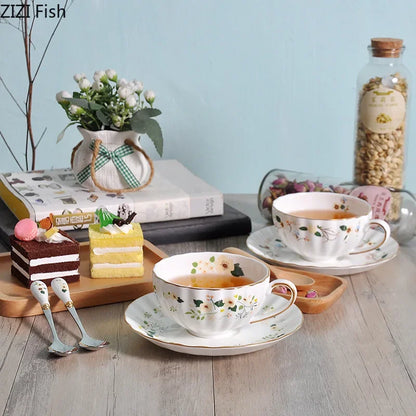 DecorBites™ Elegant Gold Flower Cup & Saucer Set - Delicate Porcelain Tea Coffee Mug