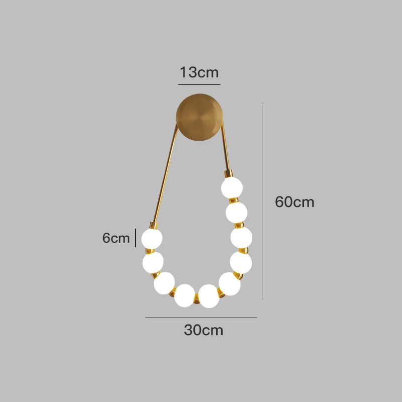 Lámpara de pared asimétrica DecorBites™ estilo italiano color crema con forma de haba mágica