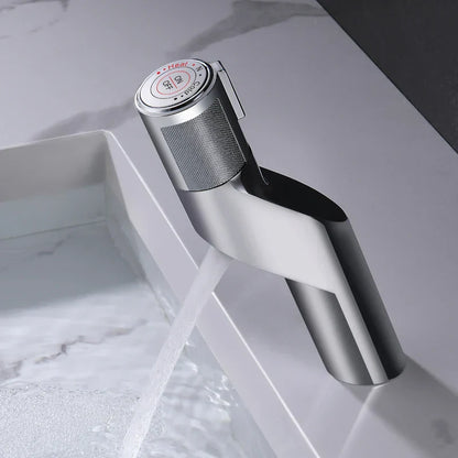 Grifo de lavabo DecorBites™ Gold: Grifo monomando con pulsador para baño, de latón.