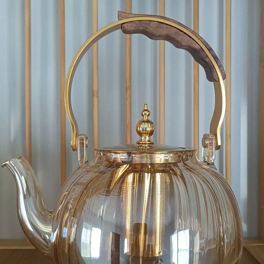 DecorBites™ Amber Glass Teapot Filter, Heat-Resistant, Pumpkin-Shaped, Ideal for Boiling and Brewing Tea