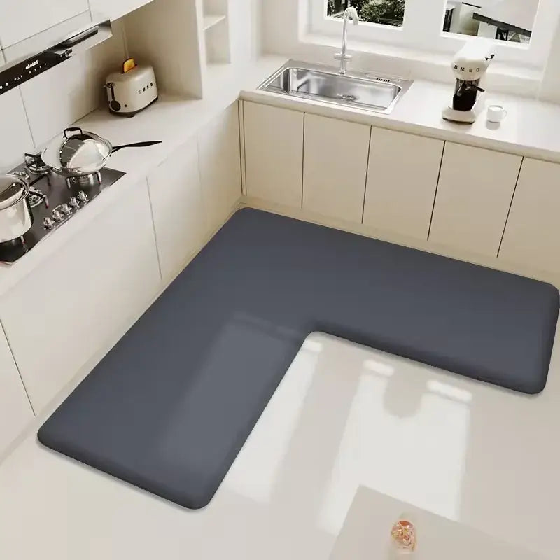 Dark gray l-shaped kitchen mat with a smooth, non-slip surface.