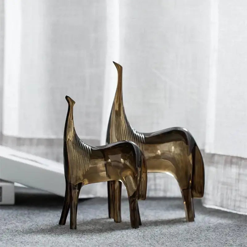 Two amber glass horse couple figurines with ribbed detailing sculpture set for living room decor by decorbites