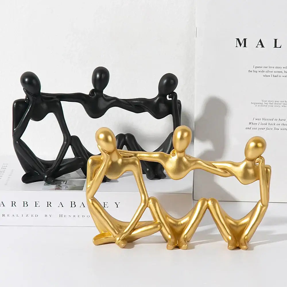 Abstract friendship figurine in golden and black with smooth glossy finish for living room decor and friendship figurine