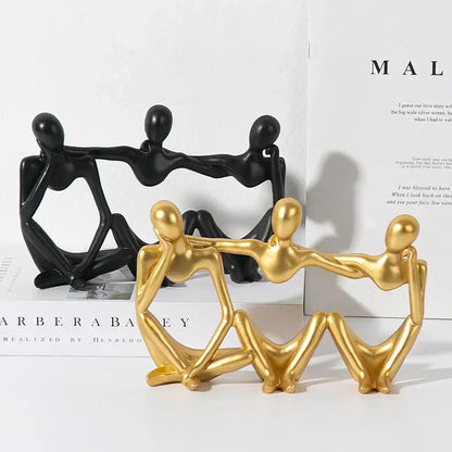 Abstract friendship figurine in golden and black with smooth glossy finish for living room decor and friendship figurine