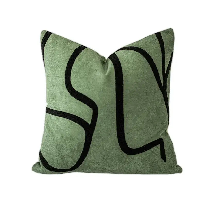 A soft sage green velvet pillow cover with bold black abstract line art for decorbites beige textured pillow