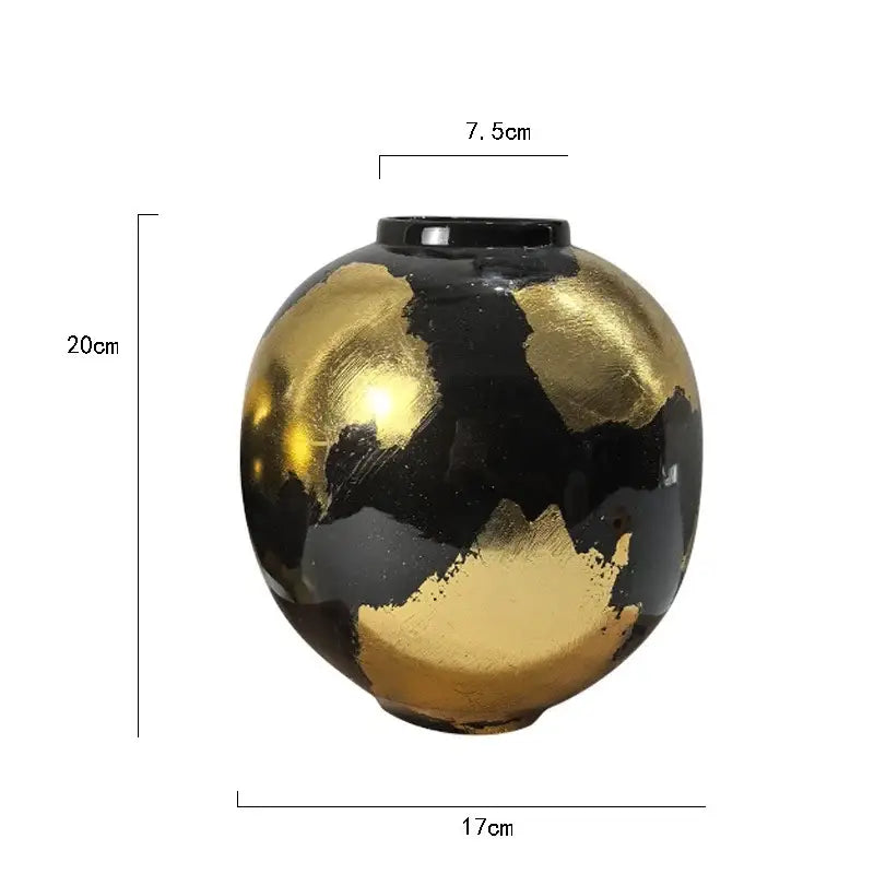 Abstract black and gold foil pattern ceramic vase with rounded body featuring bold gold foil brushstroke patterns for living room decor