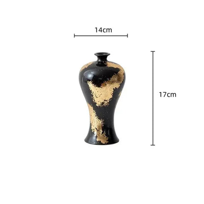 Elegant black ceramic vase with gold foil pattern accents, 14cm wide and 17cm tall, ideal for living room decor