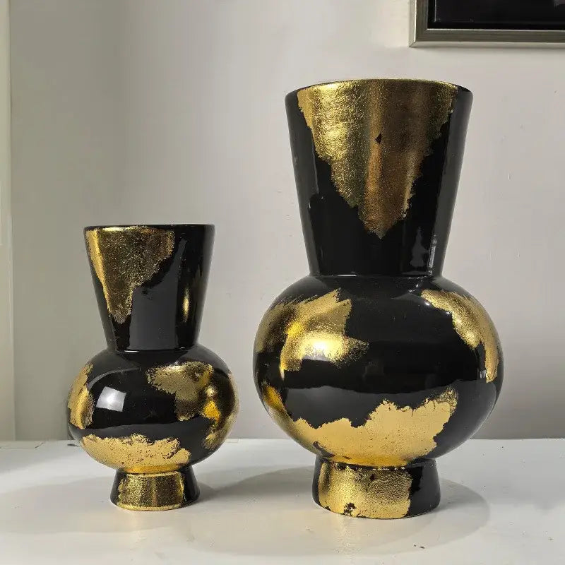 Black ceramic vases with gold foil pattern accents for living room decor featuring abstract gold foil design