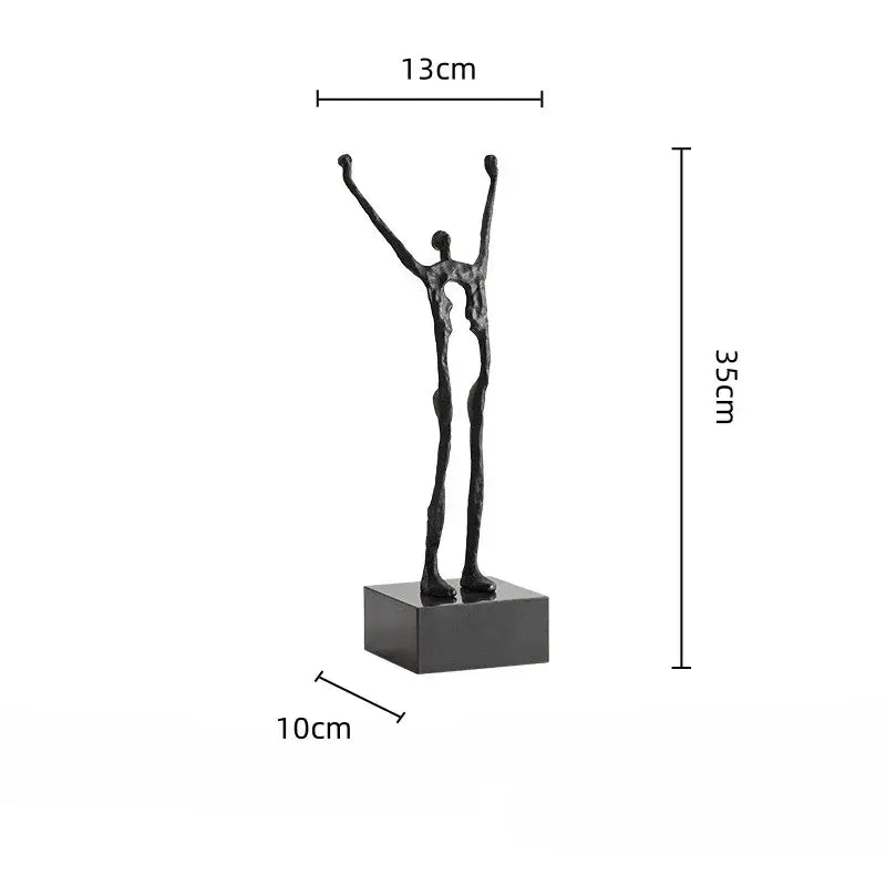 Black abstract human figure sculpture with elongated limbs raised upward on square base for living room decorbites decor