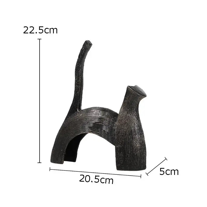Abstract black cast iron bull statue with sleek textured resin cat figurine featuring minimalist design for decorbites bull decorbites bull statue