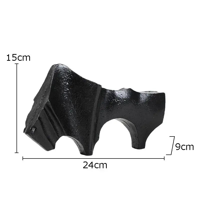 Black textured ceramic planter shaped like a stylized animal head with arched opening decorbites bull statue decorbites bull