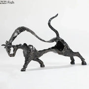 Abstract black cast iron bull statue featuring two intertwined animals in dynamic poses for living room decorbites bull decor
