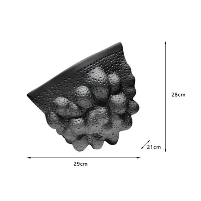 Black ceramic pleated vase wall-mounted shelf with textured bubble surface and perforated top for modern decorbites decor