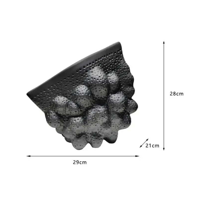 Black ceramic pleated vase wall-mounted shelf with textured bubble surface and perforated top for modern decorbites decor