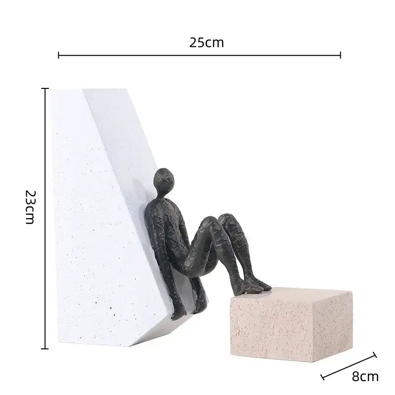 Black abstract gymnast metal handicraft figure seated against white block for living room decorbites decor