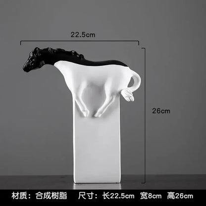 A sleek black and white resin horse abstract sculpture on a white pedestal for living room decorbites golden horse collection