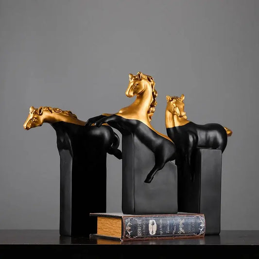 Three elegant black and gold glossy horse abstract sculptures perfect as decorbites golden horse figurines for living room
