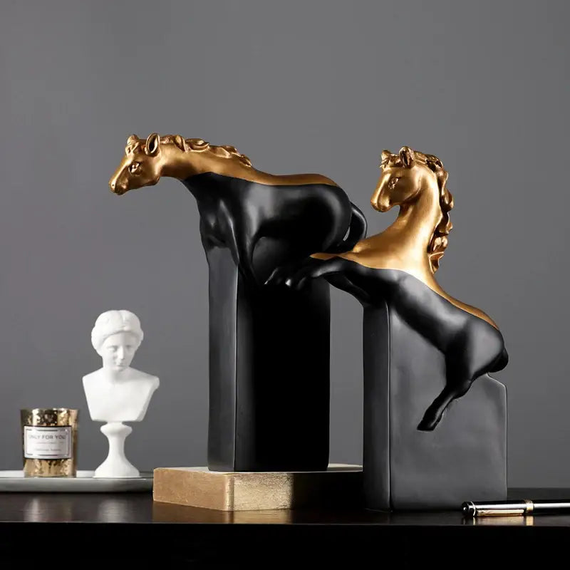 Two sleek black horse abstract sculptures with golden manes on bases ideal for living room decorbites golden horse decor