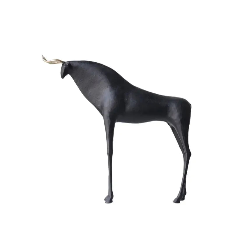 Abstract black and gold iron horse figurine featuring a black matte bull sculpture with polished gold horns for living room decor