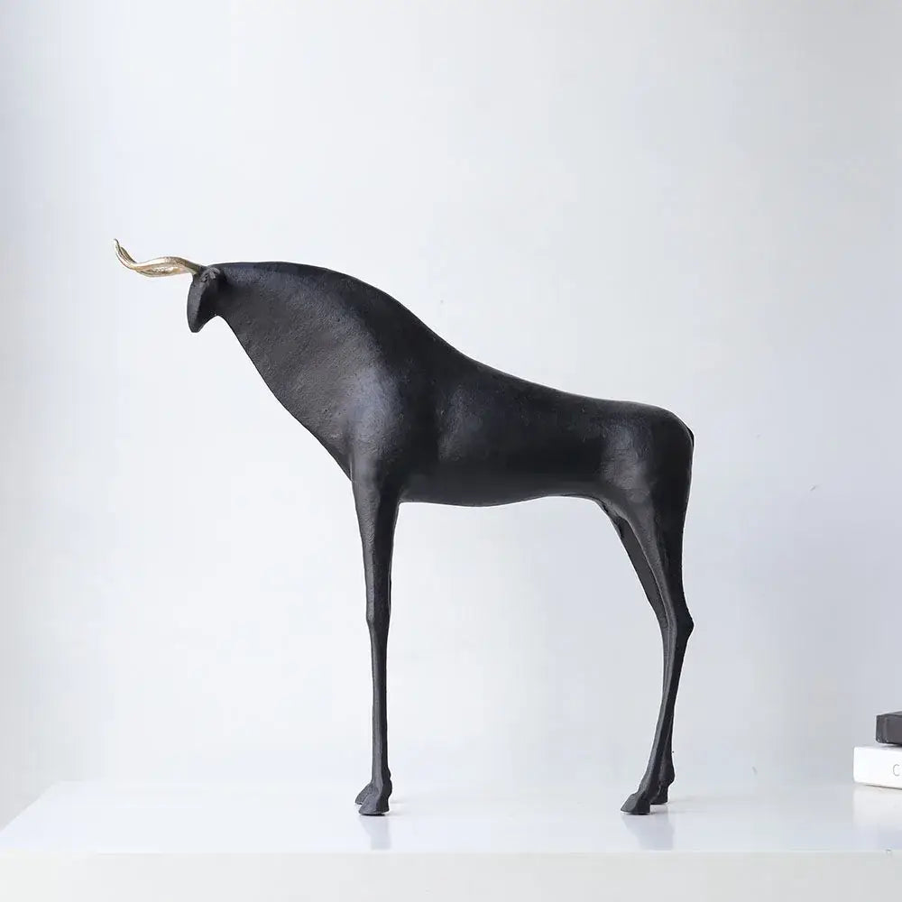 Abstract black and gold iron horse figurine with matte finish and gold horns for living room bull decor