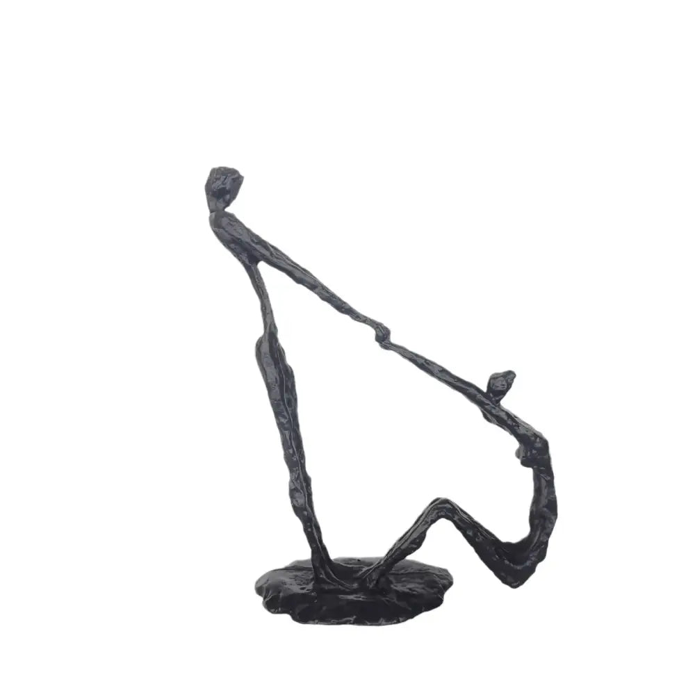 Black abstract hand dance sculpture featuring two intertwined figures on a base for living room decor