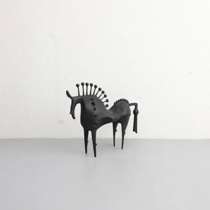 Black metallic metal sculpture horse figurine with spiky mane and studs for living room decorbites abstract horse decor