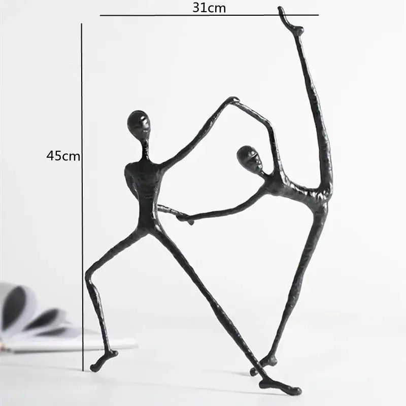 Abstract black metal sports figure sculpture of two dancing figures 45cm tall 31cm wide decorbites black metal decor