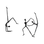 Abstract black metal sports figure sculpture by decorbites featuring two dynamic stylized human forms for living room decor