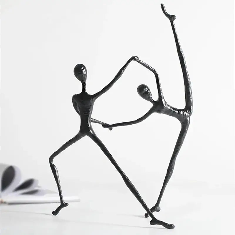 Abstract black metal sports figure sculpture of two stylized dancing figures for living room decorbites decor