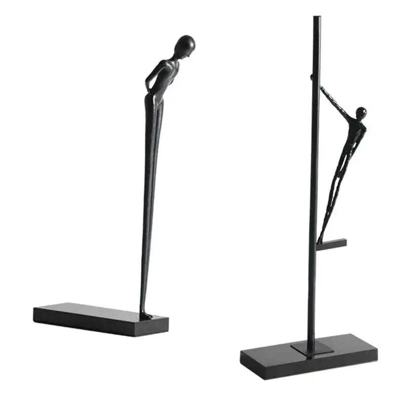 Two sleek black metal sports figure sculptures featuring dynamic poses for abstract decorbites black metal decor