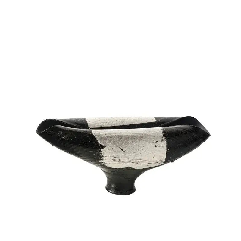 Black and white ceramic bowl with flared asymmetrical rim and textured glaze for decorbites elliptic resin flower pot use