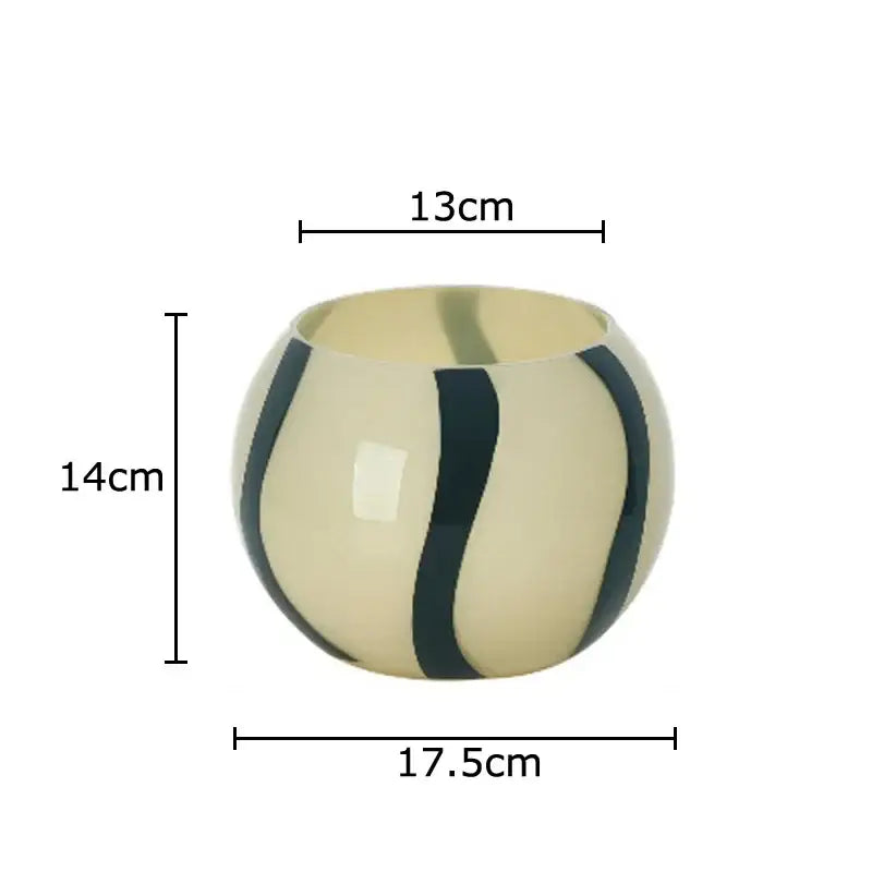 Cream-colored ceramic vase with bold wavy black stripes for decorbites black stripes living room decor