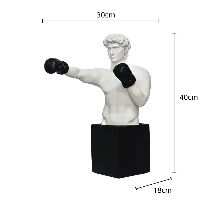 White resin decorbites boxer resin statue in mid-punch pose with black gloves on a square black base for living room decor