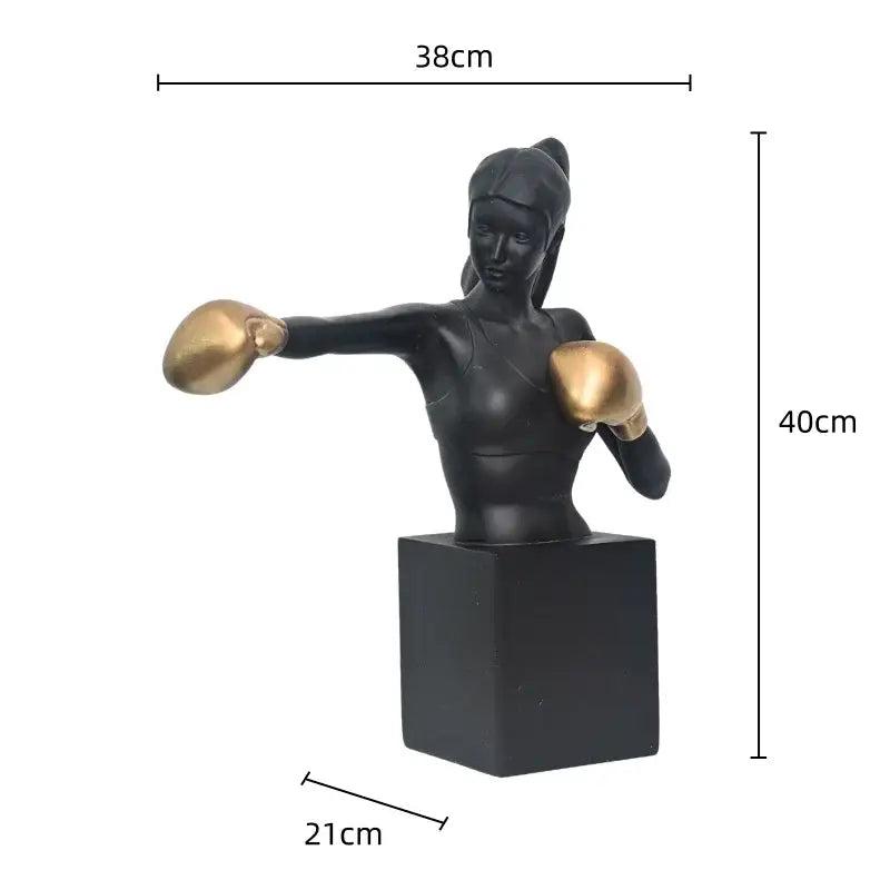 Abstract black and white boxer resin statue featuring black and gold decorbites boxer resin in mid-punch pose on black base
