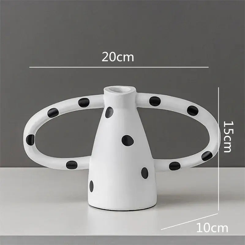White ceramic decorbites ceramic vase with black white spots and two curved handles for living room decor