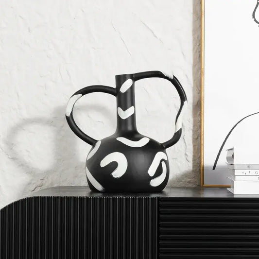 Black ceramic geometric striped vase with bold white abstract handle and dual curved handles for living room decorbites decor