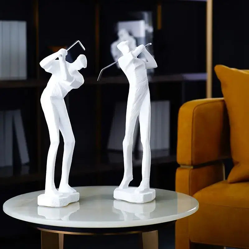 Two sleek white ceramic golf player sculptures in minimalist abstract design for decorbites golf player living room decor