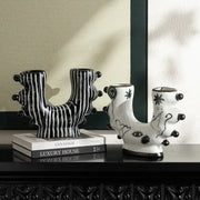 Black and white decorbites graffiti ceramic vase with abstract organic shapes and decorative black spheres for living room decor