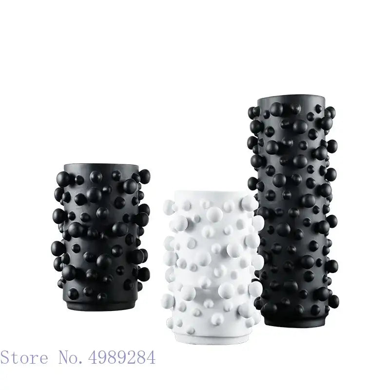 Set of three black and white abstract resin vases with irregular bumps for living room decor by decorbites black white