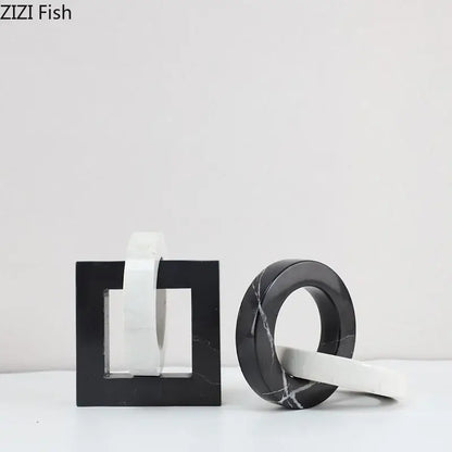 Black and white marble bookends with abstract square ring geometric knot design for modern living room decor