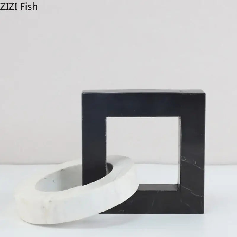 Abstract black and white marble geometric knot square ring statue bookends with modern minimalist design for living room use