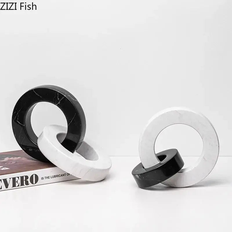 Abstract black and white marble round ring sculpture for living room decor made of polished marble round ring shapes